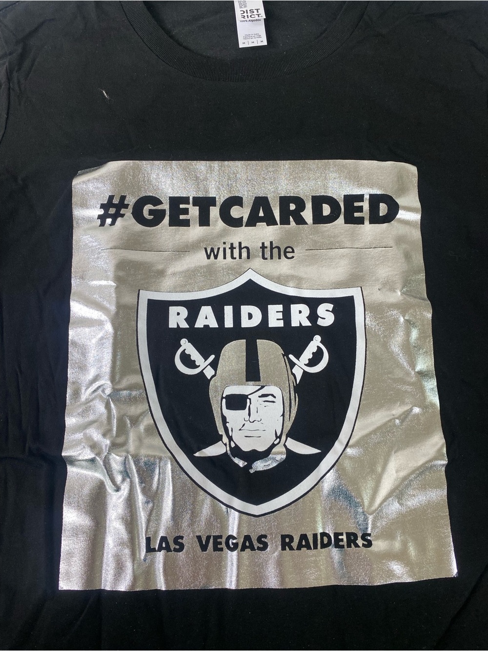 District Black T‑Shirt with Silver Raiders Graphic